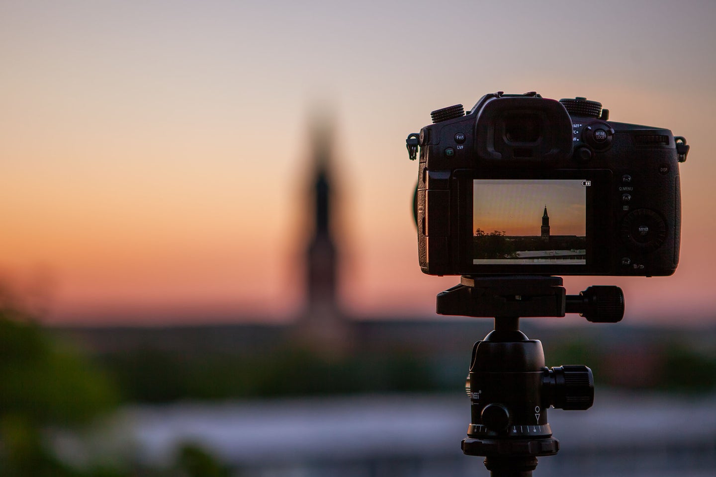 camera on a tripod facing a sunset using the best micro SD card